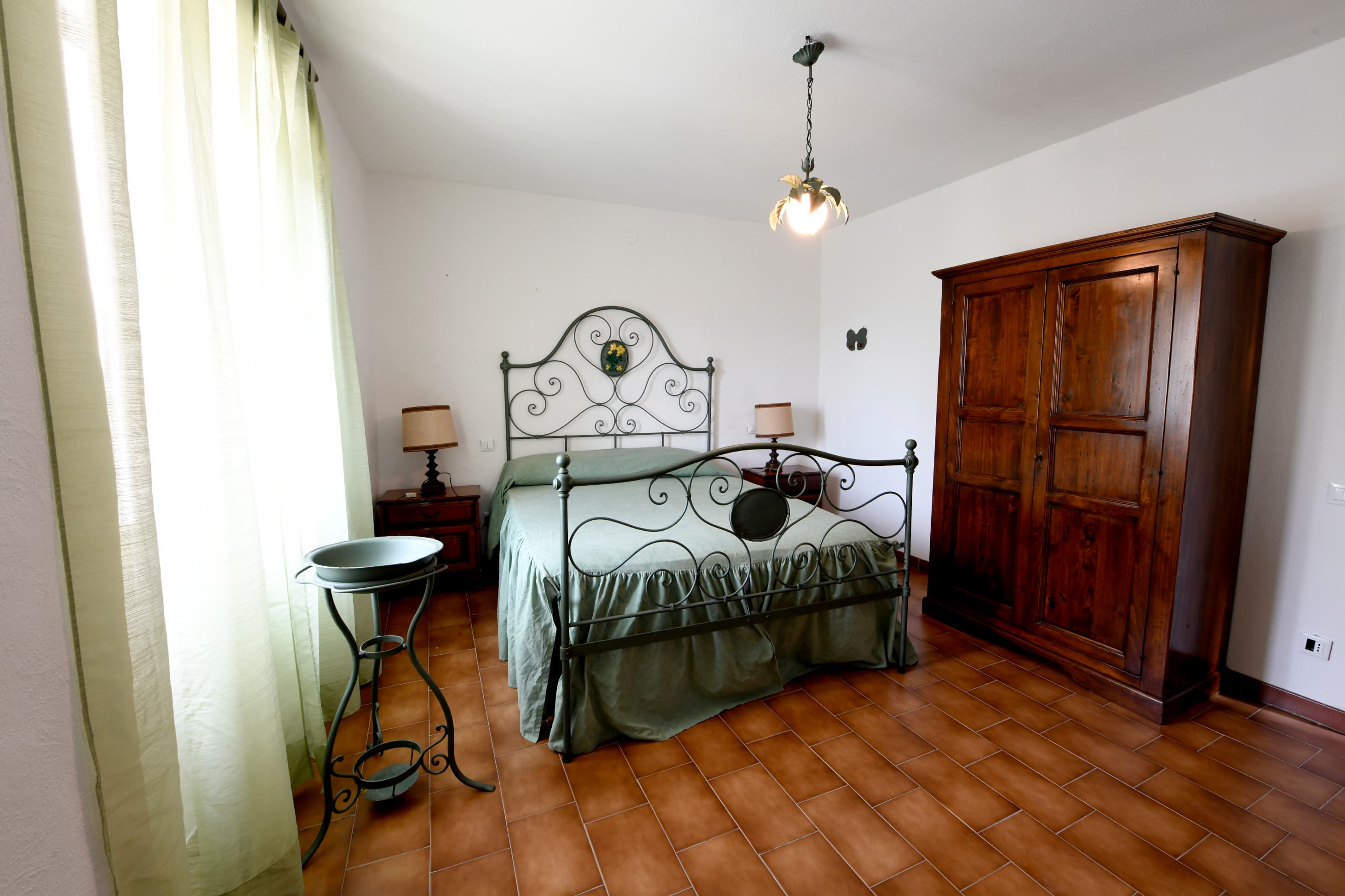 double bedroom decorated in a rustic style