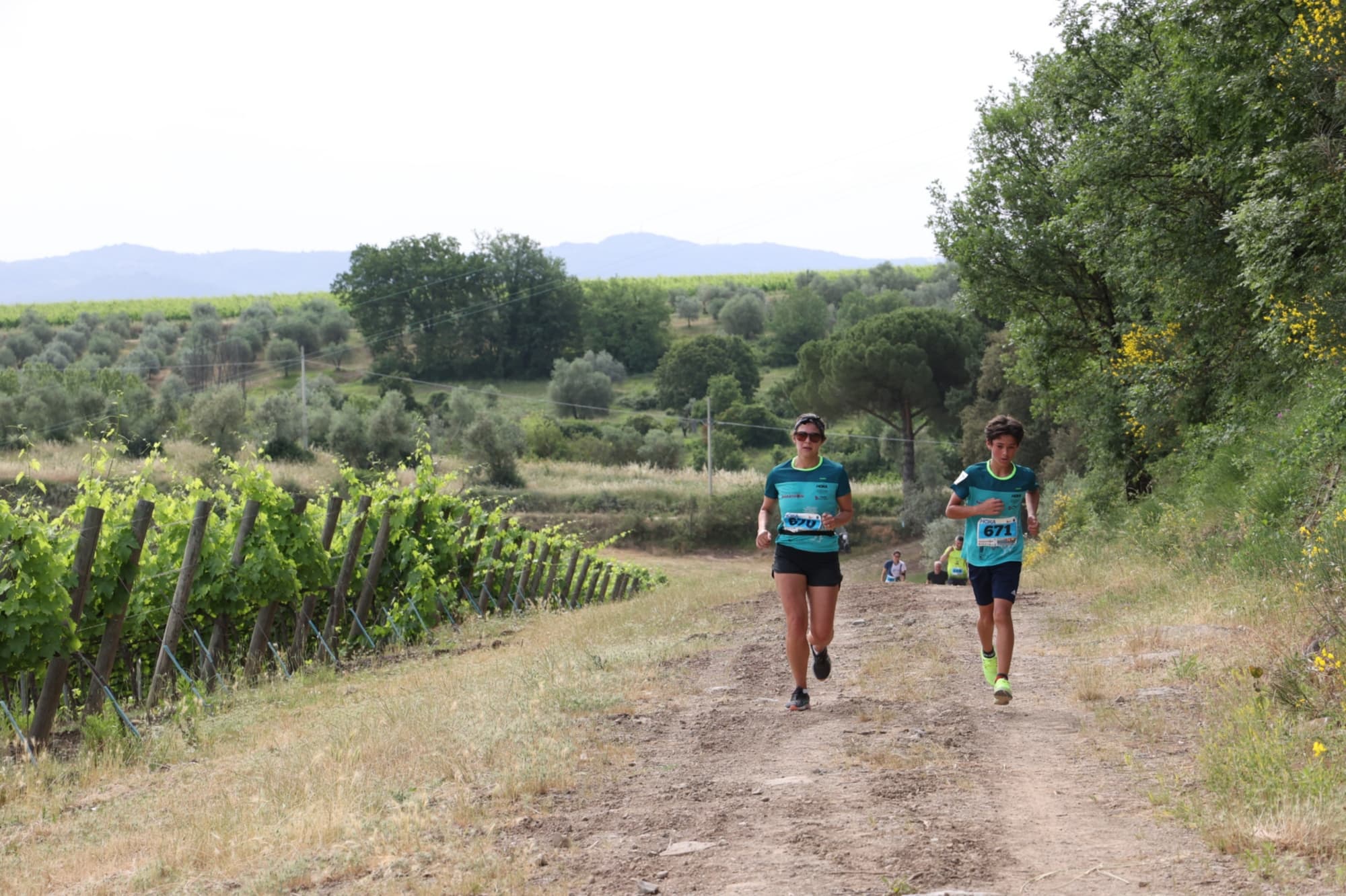 Running among the Chianti vineyards