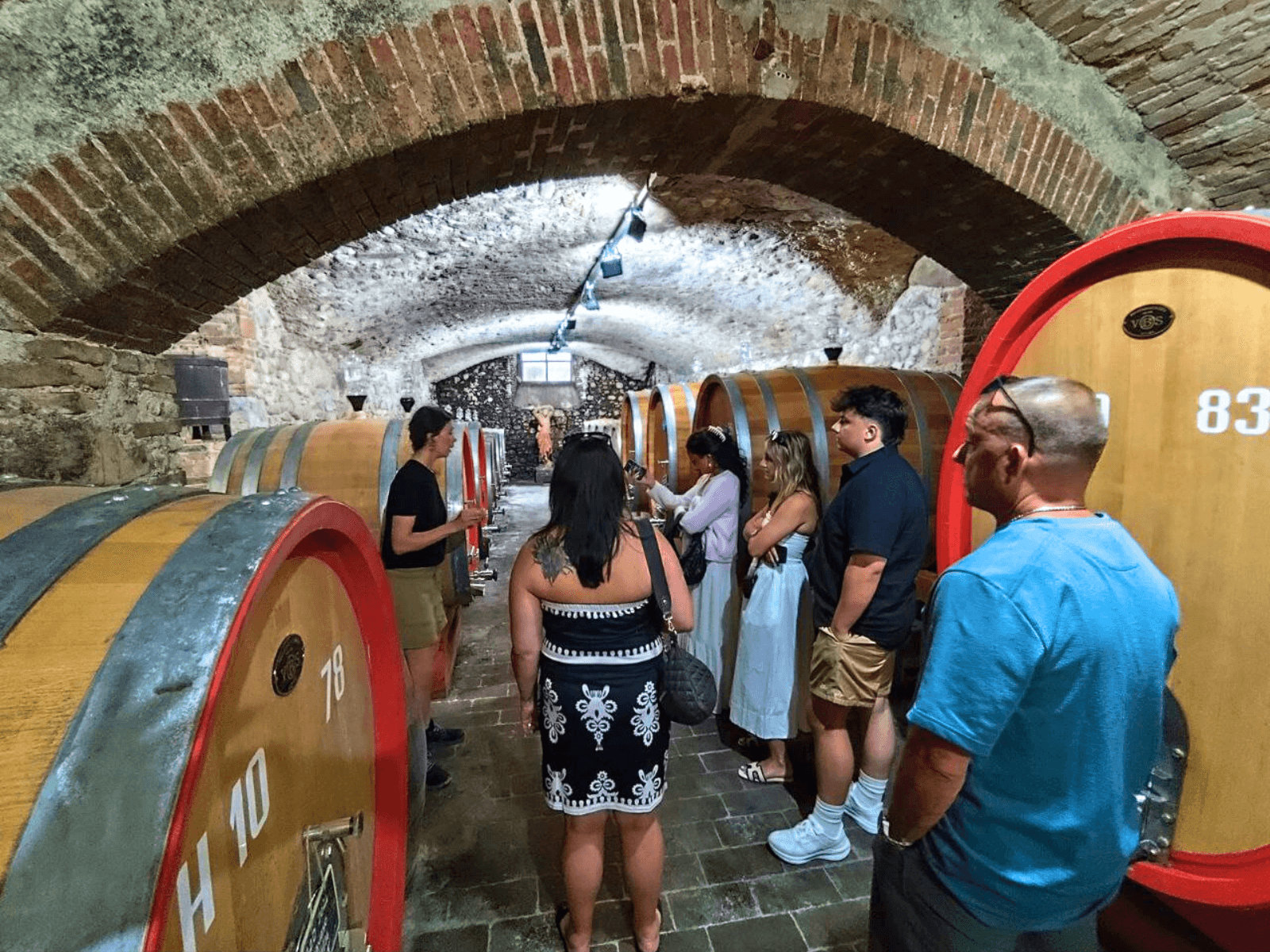 Winery cellar with wooden barrels