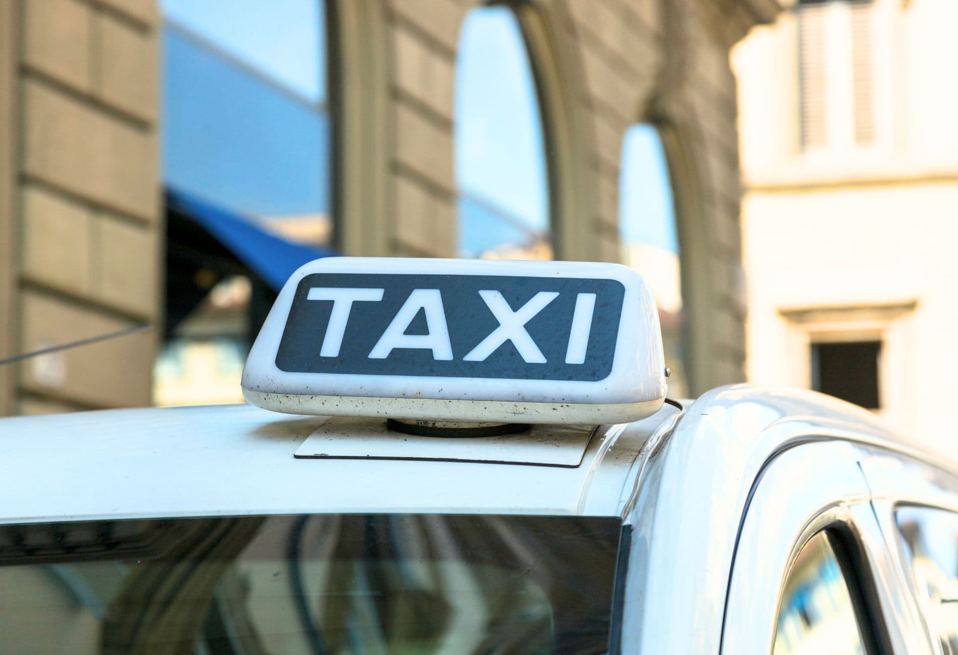 Close up of a cab sign in the city center