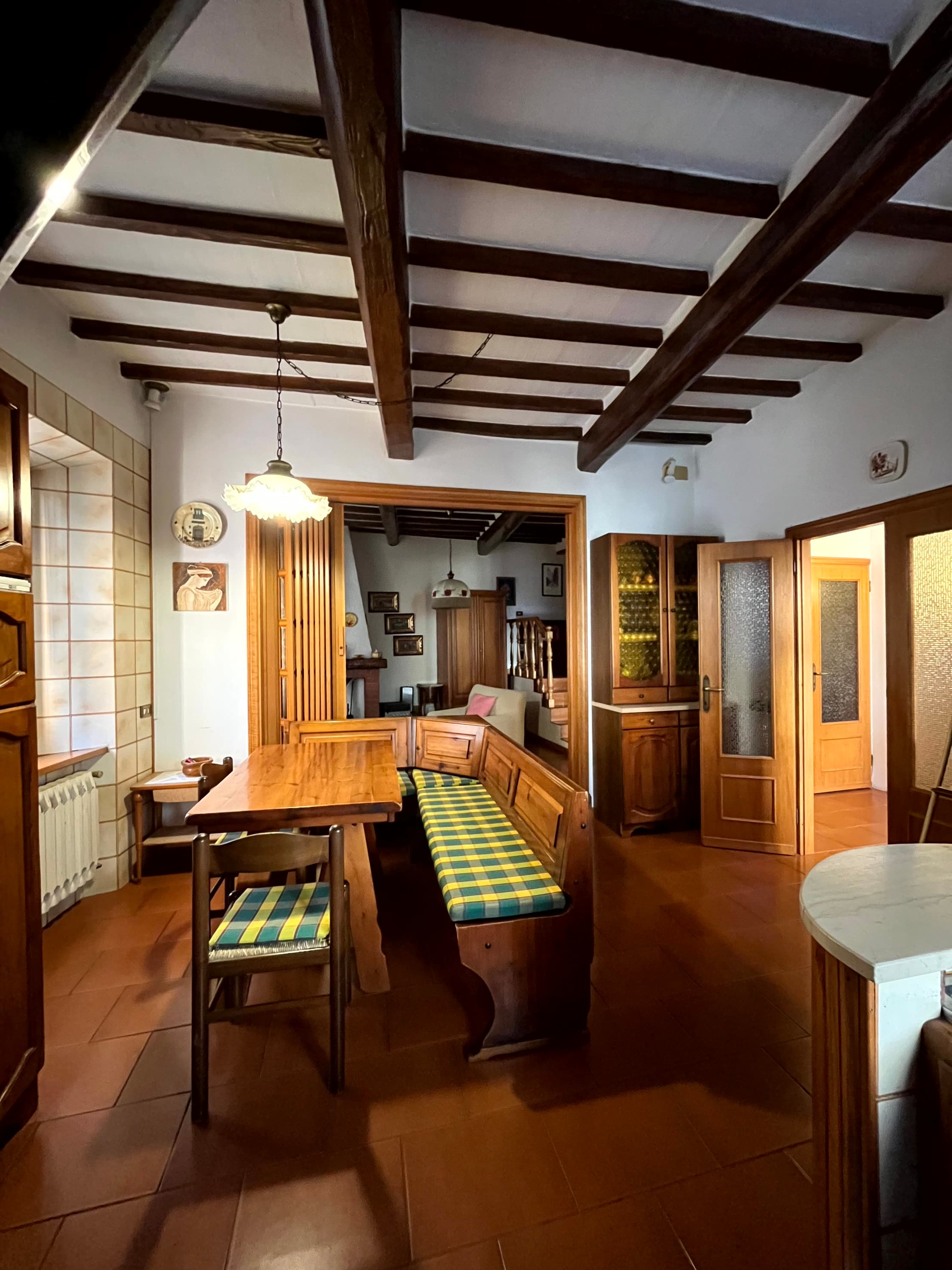 Dining area at L'Appaltino Radicofani with wooden beam ceiling