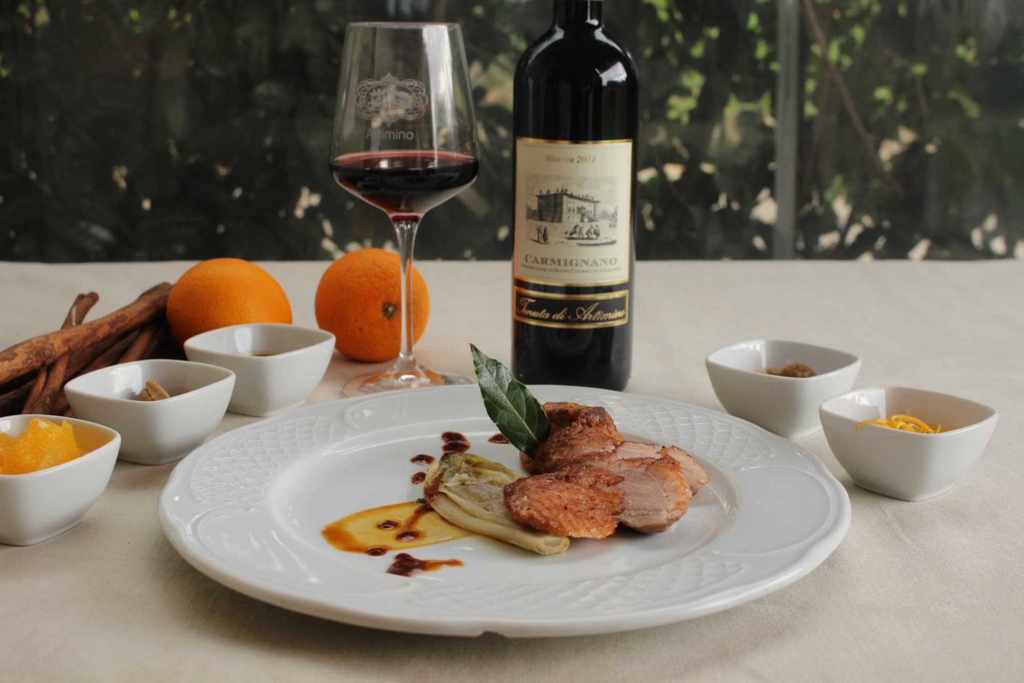Ente mit Orangen, begleitet von dem Carmignano