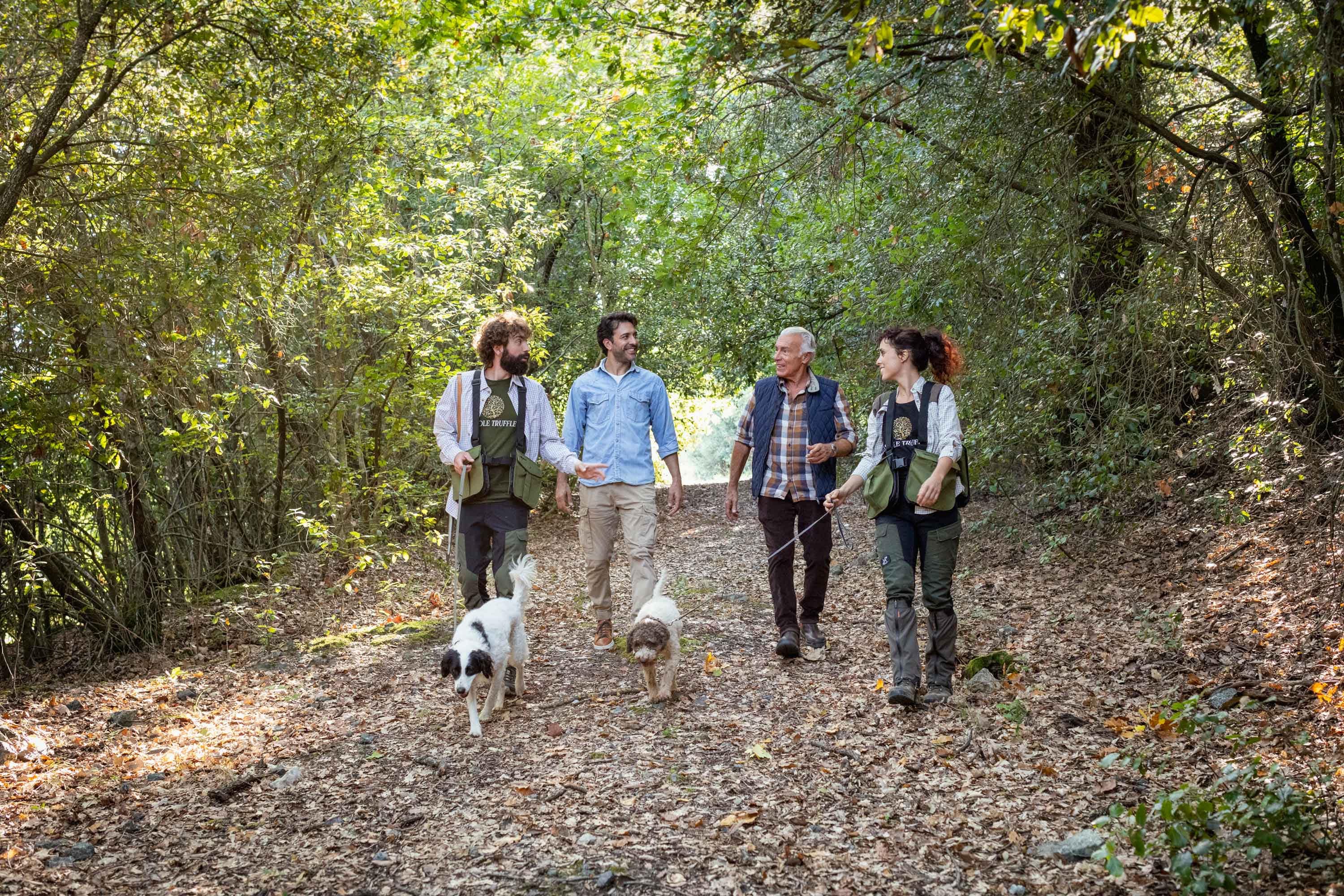 Group of people with truffle dogs