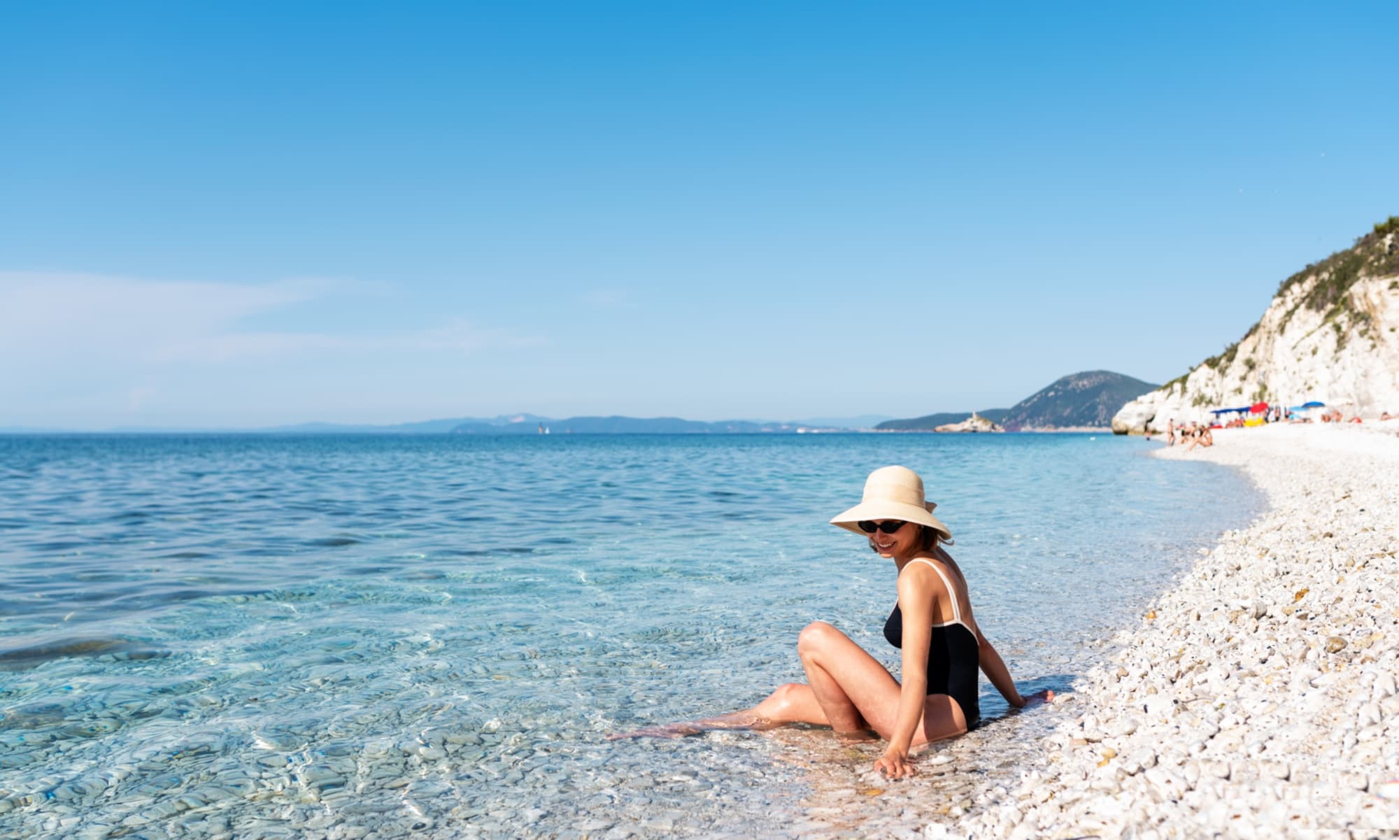 Spiaggia di Capo Bianco con bagnante