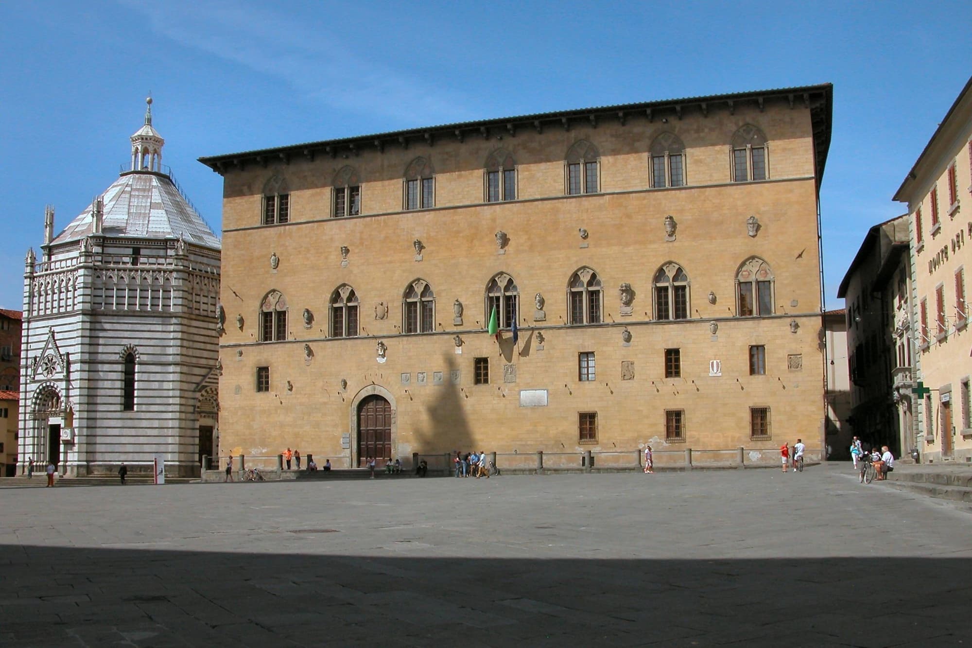 The façade of the Palazzo Pretorio in Pistoia, alongside the Baptistery